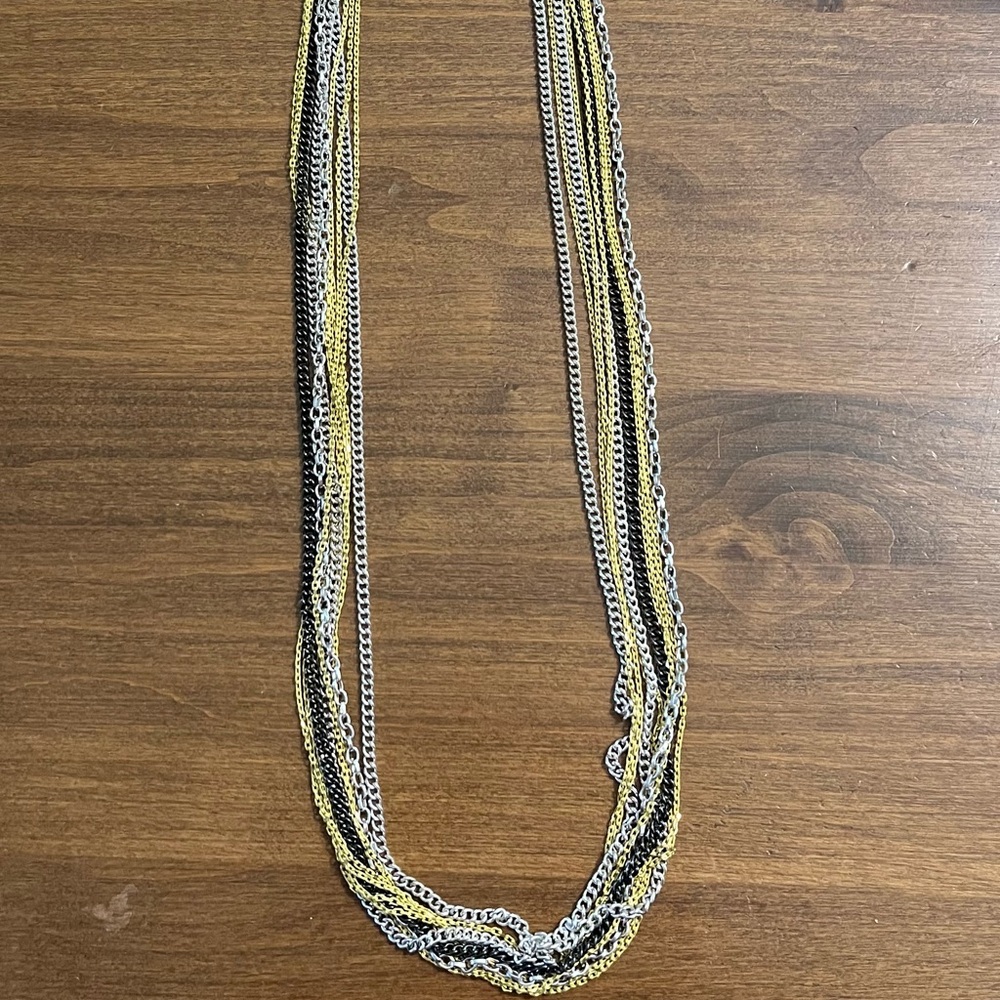 Kenneth Cole Multi Chain Necklace 36”
Silver, Gold and Black Lobster Claw